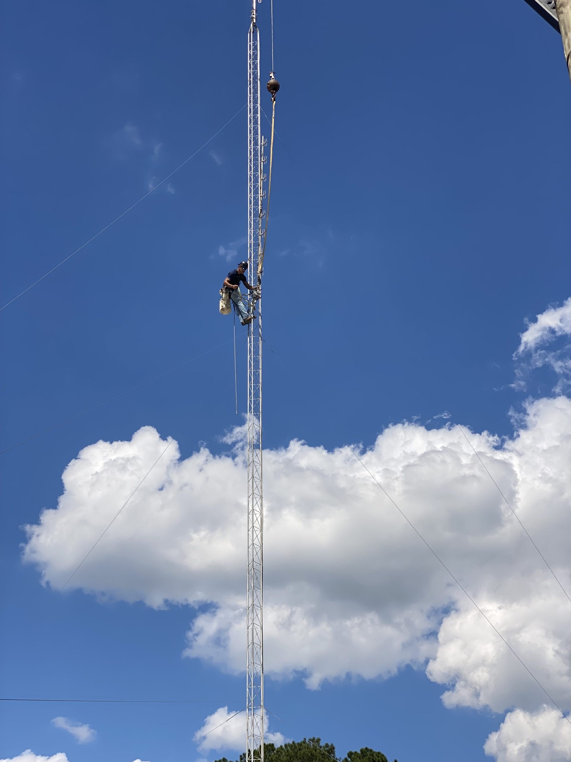 A crane crew from Hightower Communications Inc. mounts new antennas on The Filling Station’s tower in Pollocksville on Sept. 30.